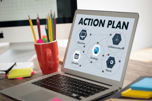 photo of laptop on desk showing action plan for optimizing local seo for franchises